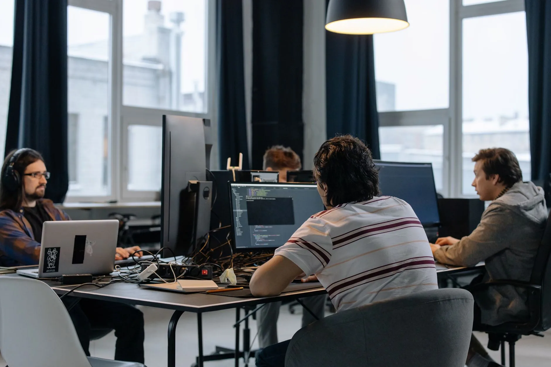 IT team collaborating in a modern office